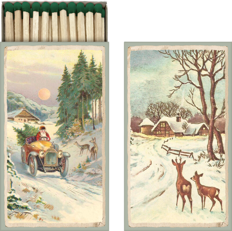 lange streichhölzer in einer vintage pappschachtel die beidseitig bedruckt ist mit einem weihnachtsmann im auto und rehen im schnee